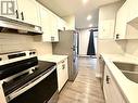 43 Taylor Avenue Unit# 103, Chatham, ON  - Indoor Photo Showing Kitchen With Double Sink 