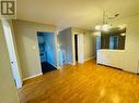 Empty room featuring light wood-type flooring and a chandelier - 49 Beaver Crescent, North Bay, ON  - Indoor Photo Showing Other Room 