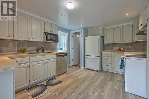 5105 Battersea Road, South Frontenac, ON - Indoor Photo Showing Kitchen With Double Sink