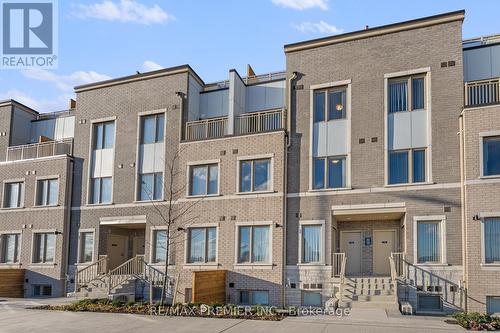 338 - 100 Honeycrisp Crescent, Vaughan, ON - Outdoor With Facade