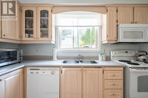 64 - 5475 Lakeshore Road, Burlington, ON - Indoor Photo Showing Kitchen With Double Sink