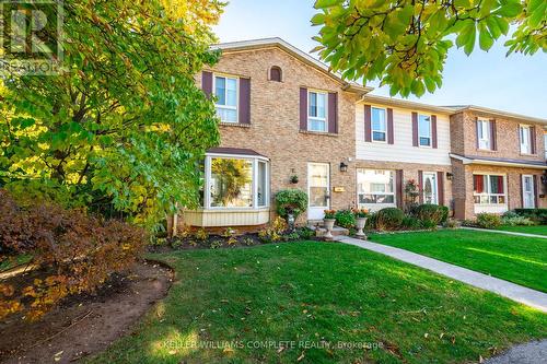 64 - 5475 Lakeshore Road, Burlington, ON - Outdoor With Facade