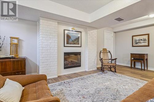 10011 Hume Court, Halton Hills, ON - Indoor Photo Showing Living Room With Fireplace