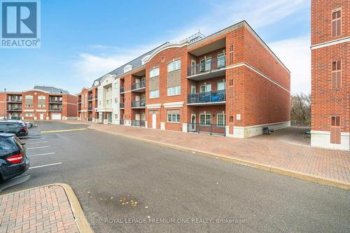 210 - 9451 Jane Street, Vaughan, ON - Outdoor With Balcony