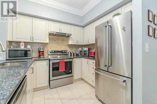 210 - 9451 Jane Street, Vaughan, ON - Indoor Photo Showing Kitchen