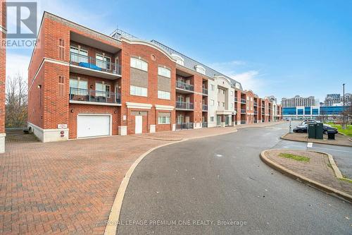 210 - 9451 Jane Street, Vaughan, ON - Outdoor With Balcony