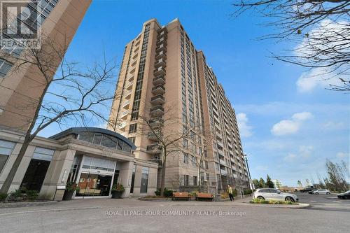 1122 - 18 Mondeo Drive, Toronto, ON - Outdoor With Facade