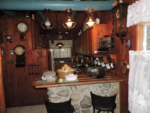 Cuisine - 230 36E Avenue, Saint-Georges, QC - Indoor Photo Showing Other Room With Fireplace