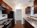 A-2511 Vancouver St, Victoria, BC  - Indoor Photo Showing Kitchen With Double Sink 