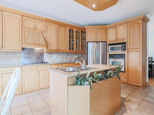 Cuisine - 16 Rue Duquette, Repentigny (Repentigny), QC - Indoor Photo Showing Kitchen With Double Sink