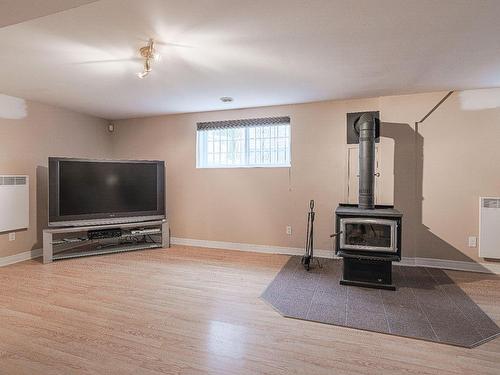 Salon - 16 Rue Duquette, Repentigny (Repentigny), QC - Indoor With Fireplace