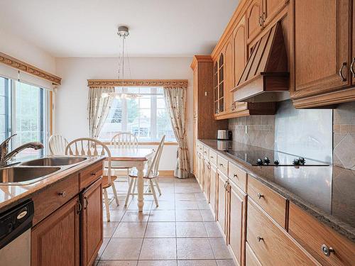 Cuisine - 16 Rue Duquette, Repentigny (Repentigny), QC - Indoor Photo Showing Kitchen With Double Sink