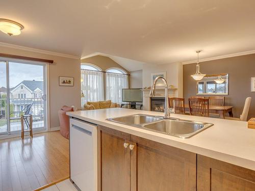 Cuisine - 301-120 Rue Ernest-Bourque, Blainville, QC - Indoor Photo Showing Kitchen With Double Sink