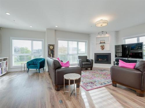 103-747 Travino Lane, Saanich, BC - Indoor Photo Showing Living Room With Fireplace