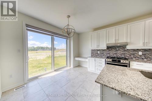 75 Barkerville Drive, Whitby, ON - Indoor Photo Showing Kitchen With Upgraded Kitchen