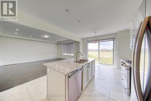 75 Barkerville Drive, Whitby, ON - Indoor Photo Showing Kitchen With Double Sink