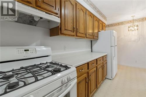 Kitchen equipped with natural gas stove, fridge and dishwasher - 118 Beley Street, Brockville, ON - Indoor Photo Showing Kitchen