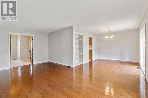 Open concept living and dining room with hardwood floors - 118 Beley Street, Brockville, ON - Indoor Photo Showing Other Room