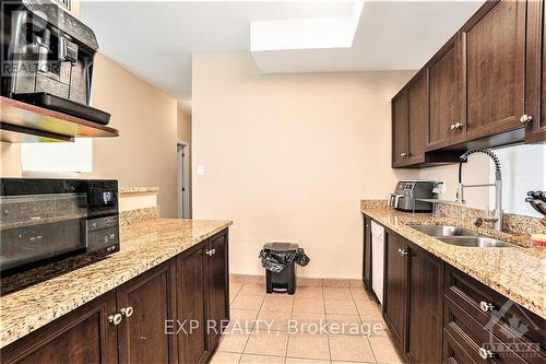 701 - 100 Roger Guindon Road, Ottawa, ON - Indoor Photo Showing Kitchen With Double Sink