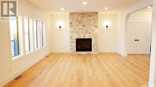 613 Weir Crescent, Warman, SK - Indoor Photo Showing Living Room With Fireplace