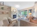 307 9319 University Crescent, Burnaby, BC  - Indoor Photo Showing Living Room With Fireplace 