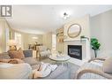 307 9319 University Crescent, Burnaby, BC  - Indoor Photo Showing Living Room With Fireplace 