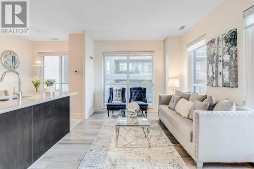 420 - 39 Annie Craig Drive, Toronto, ON - Indoor Photo Showing Living Room With Fireplace