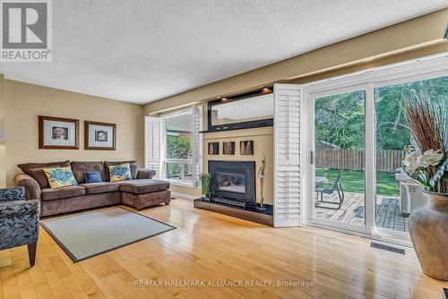 8 - 336 Queen Street S, Mississauga, ON - Indoor Photo Showing Living Room With Fireplace