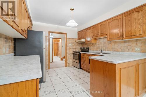 13 Hawthorne Road, Toronto, ON - Indoor Photo Showing Kitchen With Double Sink