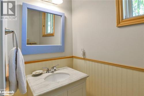 Bathroom with wood walls and vanity - 1320 360 Island, Port Severn, ON - Indoor Photo Showing Bathroom