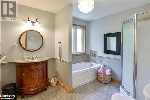 Bathroom featuring vanity and shower with separate bathtub - 1320 360 Island, Port Severn, ON - Indoor Photo Showing Bathroom