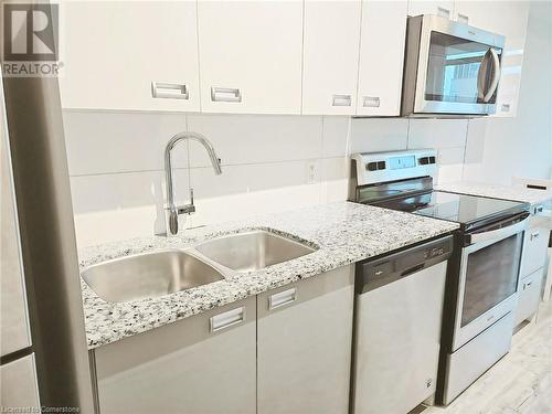 257 Hemlock Street Unit# 417, Waterloo, ON - Indoor Photo Showing Kitchen With Double Sink With Upgraded Kitchen