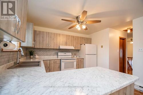 30 - 115 Mary Street W, Kawartha Lakes (Lindsay), ON - Indoor Photo Showing Kitchen With Double Sink