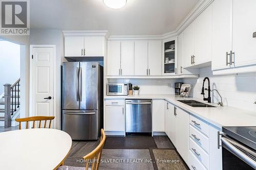 50 O'Leary Court, New Tecumseth, ON - Indoor Photo Showing Kitchen With Double Sink With Upgraded Kitchen