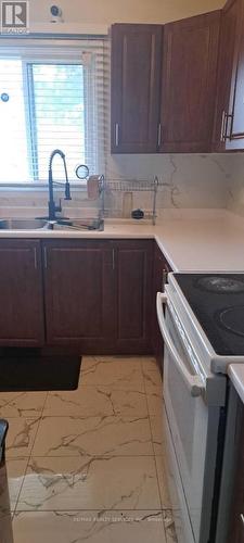 99 - 105 Hansen Road N, Brampton, ON - Indoor Photo Showing Kitchen With Double Sink