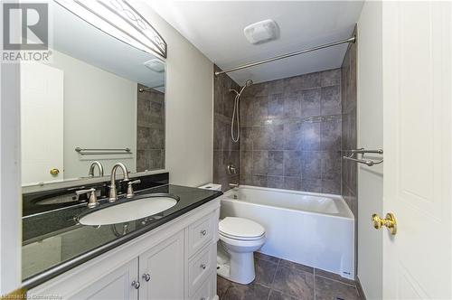 Full bathroom with vanity, toilet, and tiled shower / bath combo - 421 Beaver Creek Road, Waterloo, ON - Indoor Photo Showing Bathroom