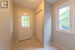 Entryway featuring a textured ceiling - 