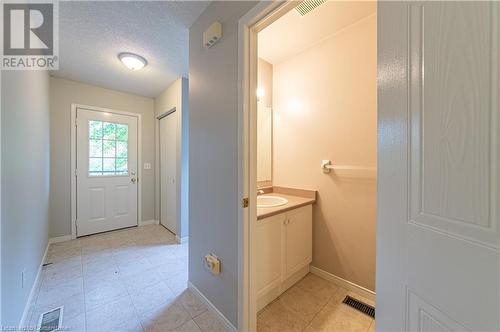 Bathroom with vanity and a textured ceiling - 421 Beaver Creek Road, Waterloo, ON - Indoor