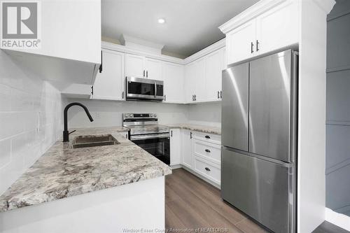 755 Grand Marais Unit# 103, Windsor, ON - Indoor Photo Showing Kitchen With Double Sink With Upgraded Kitchen