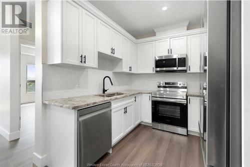 755 Grand Marais Unit# 103, Windsor, ON - Indoor Photo Showing Kitchen With Double Sink With Upgraded Kitchen