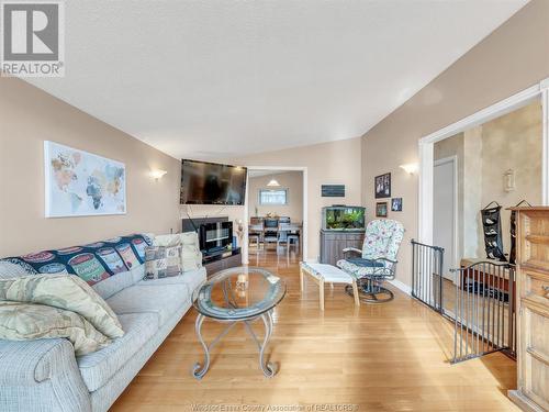 9645 Midfield, Windsor, ON - Indoor Photo Showing Living Room With Fireplace