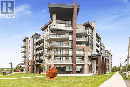 403 - 600 North Service Road, Hamilton, ON - Outdoor With Facade