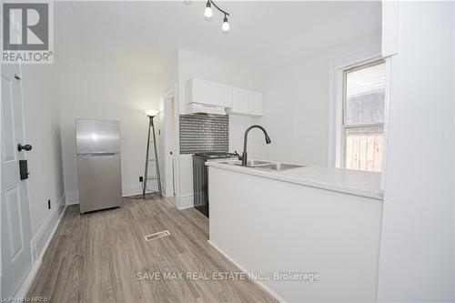 710 Adelaide Street N, London, ON - Indoor Photo Showing Kitchen With Double Sink