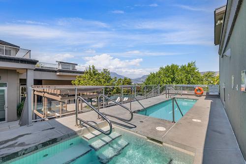 111-1495 Graham Street, Kelowna, BC - Outdoor With In Ground Pool