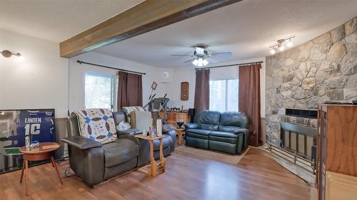 4099 Miller Road, Kelowna, BC - Indoor Photo Showing Living Room With Fireplace