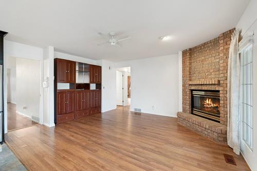 187-1201 Cameron Avenue, Kelowna, BC - Indoor Photo Showing Living Room With Fireplace