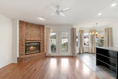 187-1201 Cameron Avenue, Kelowna, BC - Indoor Photo Showing Living Room With Fireplace