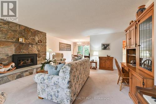 6 Haileybury Drive, Toronto, ON - Indoor Photo Showing Living Room With Fireplace