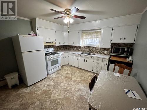 206 Wells Avenue E, Langenburg, SK - Indoor Photo Showing Kitchen With Double Sink