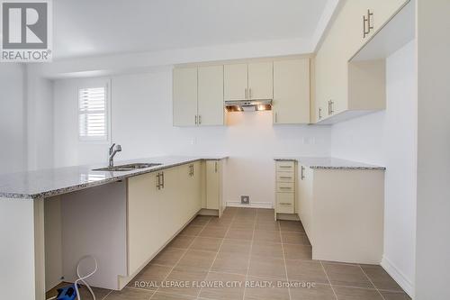 53 Brethet Heights, New Tecumseth, ON - Indoor Photo Showing Kitchen With Double Sink